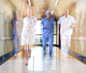 doctor shortage running in the hallway of hospital